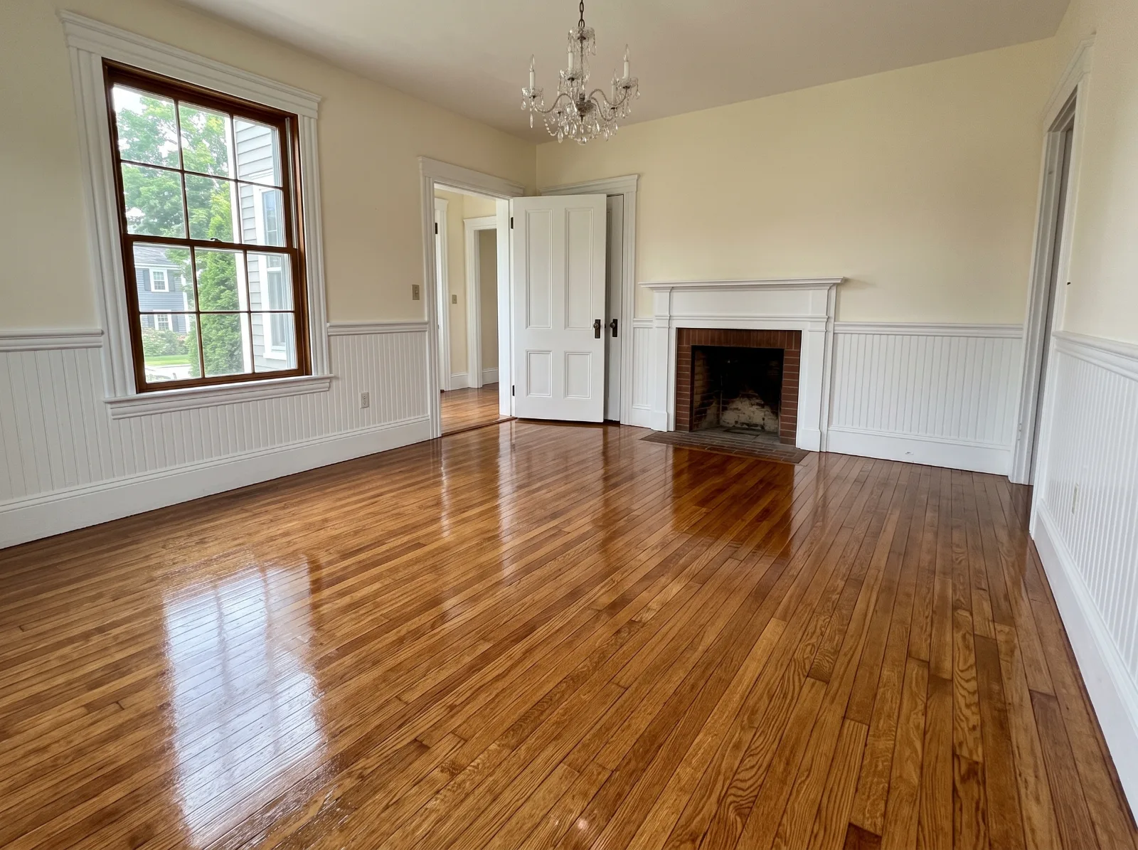 Design idea: dining room with refinished red oak strip floor in a warm brown stain